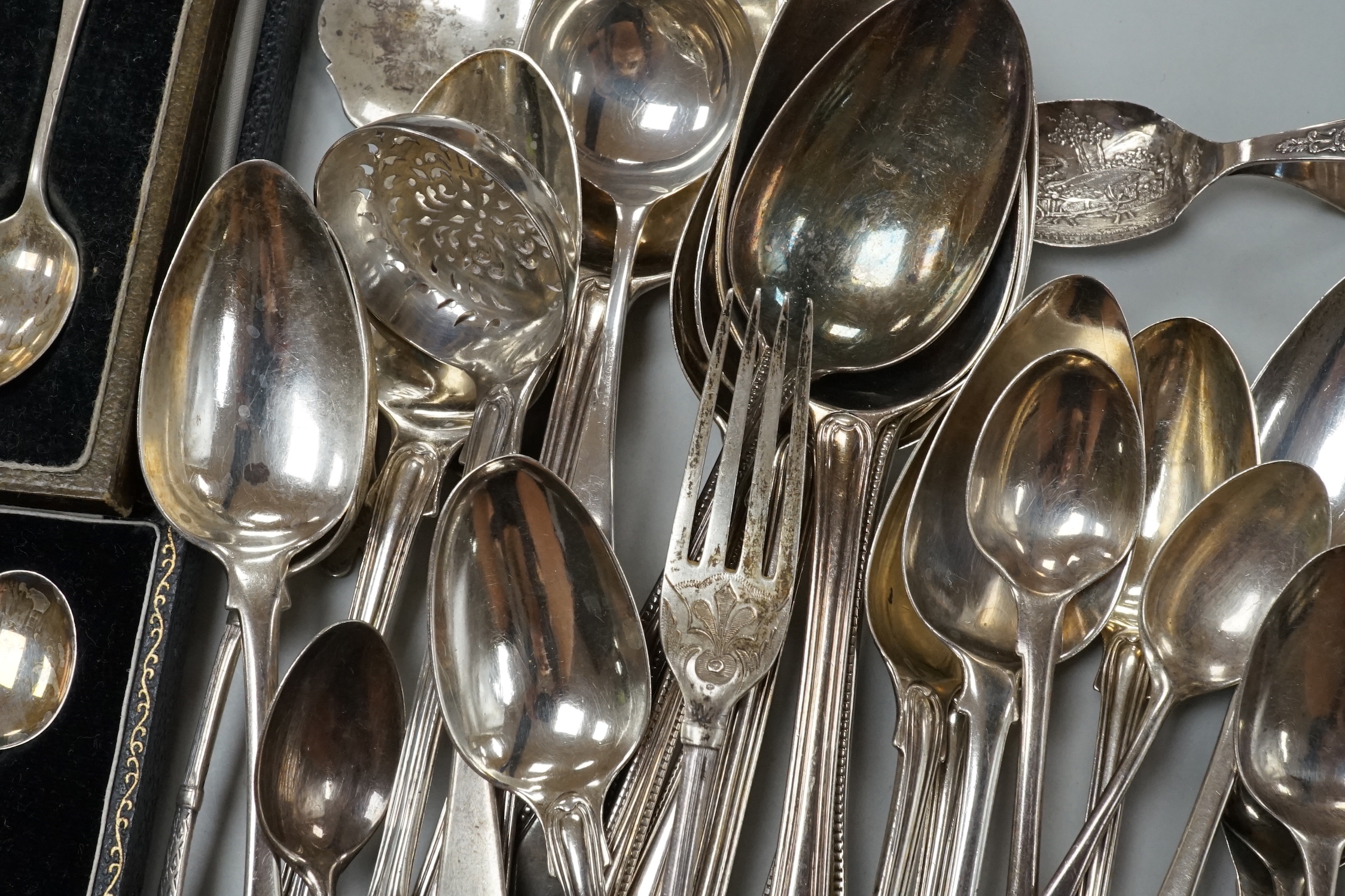 A quantity of assorted mainly 19th century and later silver flatware, various date and makers including three cased sets, 37.5oz.